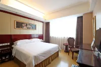 Vienna International Hotel(National Exhibition and Convention Center & West Tianshan Road) Hotel dekat coach