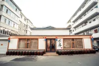 Bu'er Folk Youth Hostel (Yanji Yanbian University West Market Store)  호텔