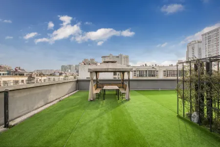 Deting Garden Hotel (Kunming hi tech West City Times store) Отели рядом с достопримечательностью «Sanjiacun Reservoir»