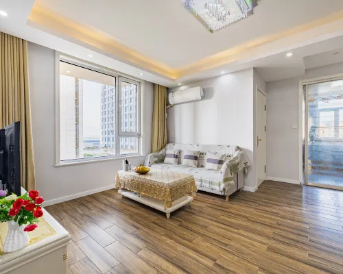 Qingyun Boutique Vacation Apartment (Weihai High-Speed Railway Station Hanlefang) Zimmer Photos