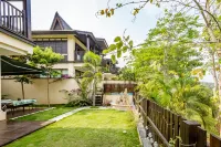 Xishuangbanna Jinghong Yunman Valley Villa Resort Hotel (Yuejingzhuang) - maisons de vacances