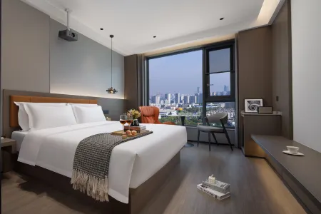 All-weather Hotel (Longxia Road, Ouhai, Wenzhou) Отели рядом с достопримечательностью «Wenzhou Vocational College of Science & Technology (West to Wenzhou Bureau of Land and Resources Lucheng Branch)»