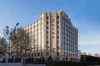 Puhua Hotel Отели рядом с достопримечательностью «National Academy of Education Administration Gymnasium»