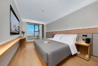 QIANNA HOTEL GLORIOUS (Zhoukou Chuanhui District High-speed Railway East Station Branch)