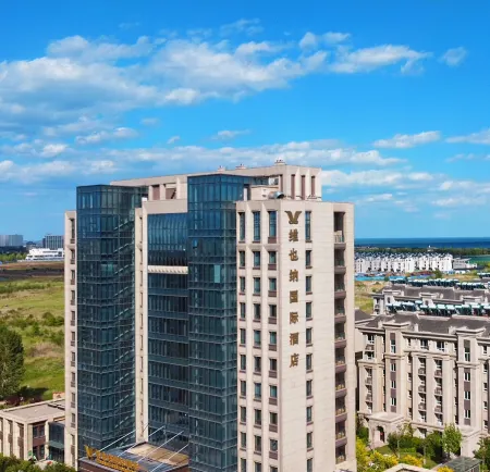 Vienna International Hotel (Qinhuangdao Nandaihe Blue Coast Bathing Beach) Отели рядом с достопримечательностью «Hebei Institute of International Business and Economics - Comprehensive Building»