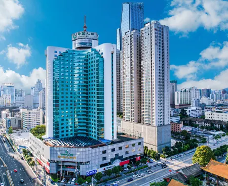 Kunming Green Land Hotel Отели рядом с достопримечательностью «Fenghuangshan Kepu Ecology Park»