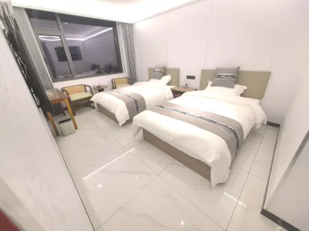 Jiuzhi B Building Xingyuan Отели в г. Хайси-Монголо-Тибетский автономный округ