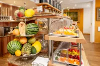 Tiptop Hotel Burgschmiet Garni - servizio colazione