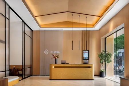 Huipuyi Comfortable Business Hotel (Linhai Yintai Branch) Отели рядом с достопримечательностью «Wangjiang Gate»