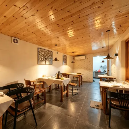 Muzi's Courtyard (Two Rivers & Four Lakes East-West Alley Branch)