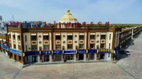 Ejina Qi Taibo Business Hotel - parkir