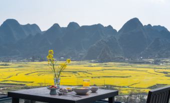 Xingyi Wanfenglin Yuejingwan Hotel