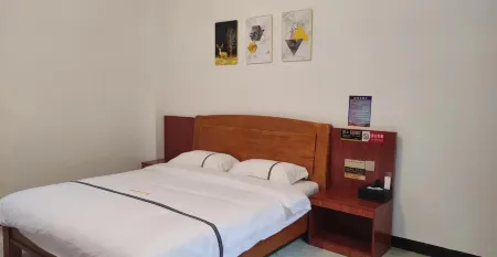 Mengla Heyou Homestay Отели рядом с достопримечательностью «Mohan»