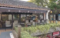 Yiman | YIMAN · HOTEL (Xitang Songzi Laifeng Bridge) - Airport Shuttle