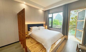 Yangshuo Banxian Bieyuan Homestay (Yulonghe Bamboo Rafting Yulongqiao Wharf Branch)