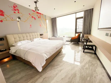 Jinfeng Theme Hotel Отели в г. Чжанпин