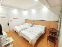 Baili Rhododendron Fenghuaxueyue Vacation Apartment