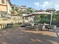 Meng Hai Yi Ke Shu Guesthouse Hotel in zona Mengzhe Bus Passenger Transport Station