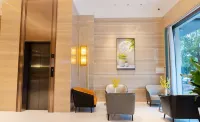Xunwu Yijia Business Hotel