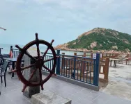 Weidaoli Hotel Отели рядом с достопримечательностью «Залив Тай-Кок»