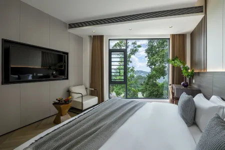 Jingmai Jingzuhao Homestay Отели рядом с достопримечательностью «The Old Bulang Ethnicity Village of Wenji»