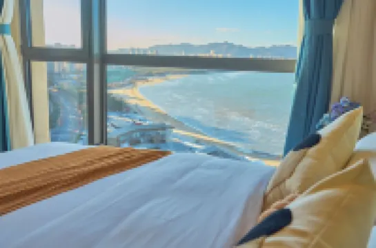 Suyuhai Loft Scenic Apartment (Weihai Railway Station Hanlefang)