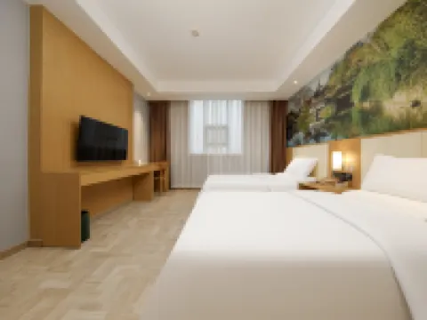 Yayue Hotel (Zhenjiang Railway Station North Square Xijin Ferry Store) โรงแรมในเจิ้นเจียง