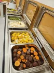 He Kou Zhenpin Guomen Hotel (He Kou Port Store) - sarapan