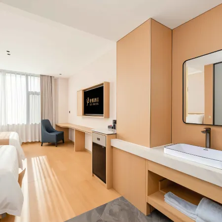 GreenTree Hospitality Group - (Gya)