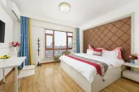 Yuecheng Boutique Business Apartment (Dalian North Station Huanan Square Subway Station) - مطابخ