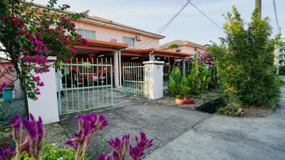 Hua Qiao Home Hotel di 