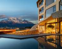 VENTO · Sunlit Golden Peak Lake View Vacation Hotel