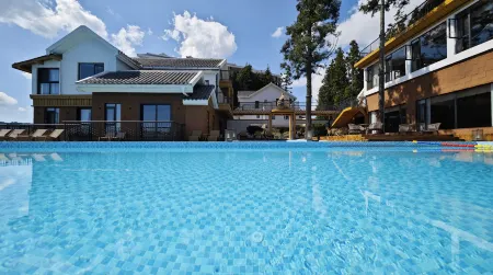 Huaxi Bieyuan Отели рядом с достопримечательностью «Huangshui National Forest Park»