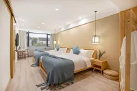 Suzhou Dao Xiang Impression Homestay (Cai Flower Sea Shop in Bei Tai Lake Tourist Vacation Area)