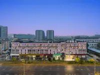 Huaju Hotel (Yangzhou Slender West Lake Wutinglong Toy City) Отели рядом с достопримечательностью «Yangmiao Passenger Transport Terminal»