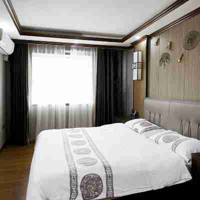 Chibi Yalong Bay Business Grand Hotel (Railway Station) Rooms