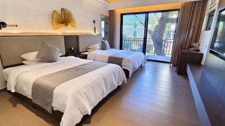 Yinxing·Menggu Homestay Отели рядом с достопримечательностью «Народная больница Города»