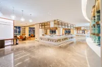 Howard Johnson Great Eagle Plaza Aksu - فطور