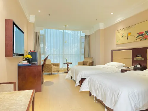 Guangcai Lijinyuan Hotel Hôtels à : Zhouqu