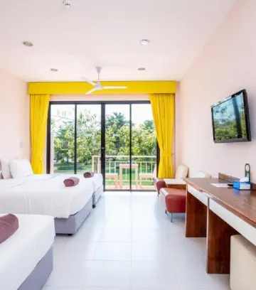 ห้องพักสำหรับสามท่านพร้อมระเบียง