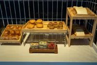 Poina Huishe Chain Hotel (Yingjiang Yinghu Park Store) - servizio colazione