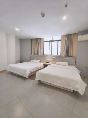 Home Pebble Hotel (Yangzhong Pedestrian Street Jiangzhou East Road)