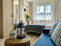 CANCUN apartment with big screen in the center of Almaty