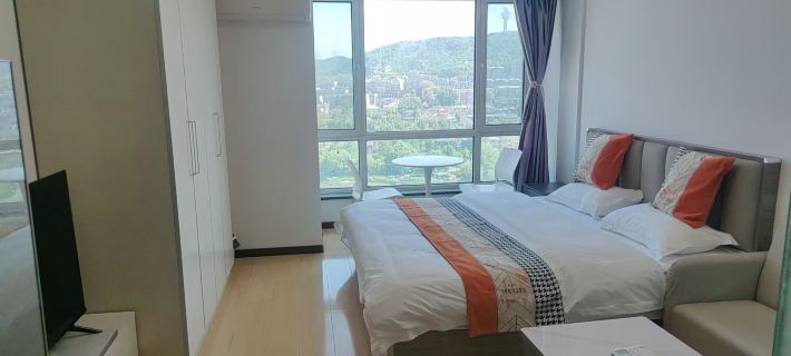 YUKE APARTMENT HOTEL Hotéis em Dalian
