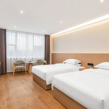 Qiyue Hotel (Zhongzhou International Mall)