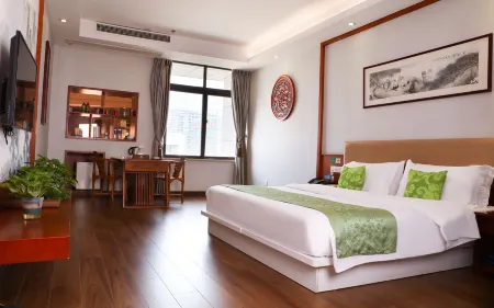 Shucha Culture Theme Hotel (Anxi Tea Bohui Wanda Plaza Branch) Отели в г. Анси