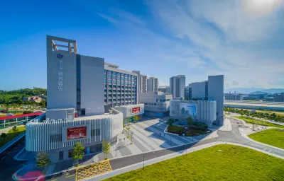 G Apartments of Fushan Hotels near Huige Grain & Oils Shop