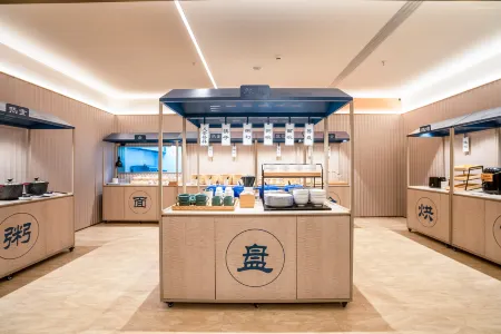 HanTing Hotel (Qujing Zhanyi Zhujiangyuan Avenue) Отели рядом с достопримечательностью «Yunnan Vocational Institute of Energy Technology»