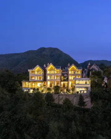 Tengchong Liuliu Xiaoshu Hot Spring Homestay Отели рядом с достопримечательностью «Beihai Wetland»
