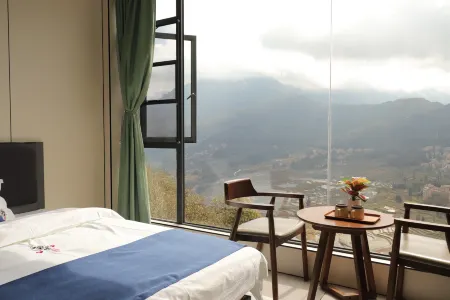 Yuanyang Yunshiguang Homestay Отели рядом с достопримечательностью «Laohuzui Terraced Field»